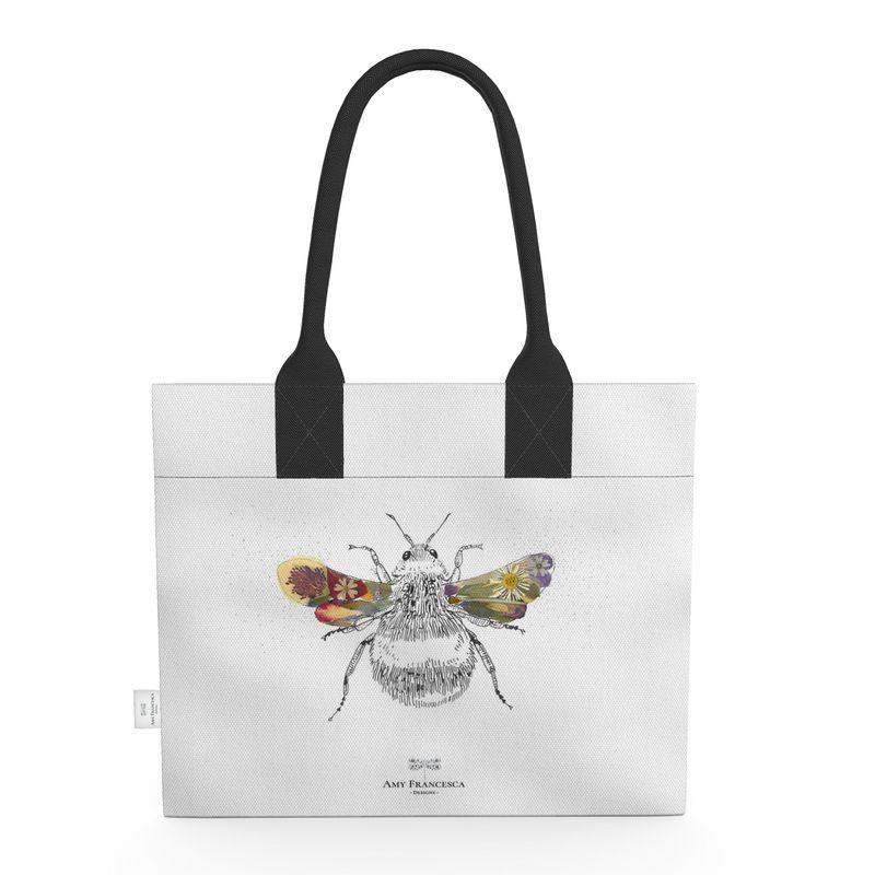 Tote bag featuring a single bee illustration on a white background with black handles.