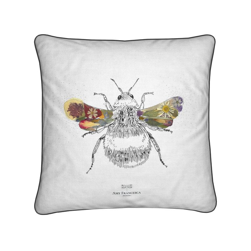 Cushion featuring a single bee illustration on a white background.