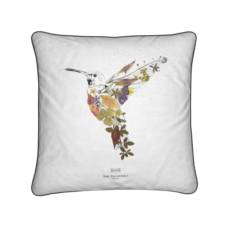 Cushion featuring a single hummingbird illustration on a white background.