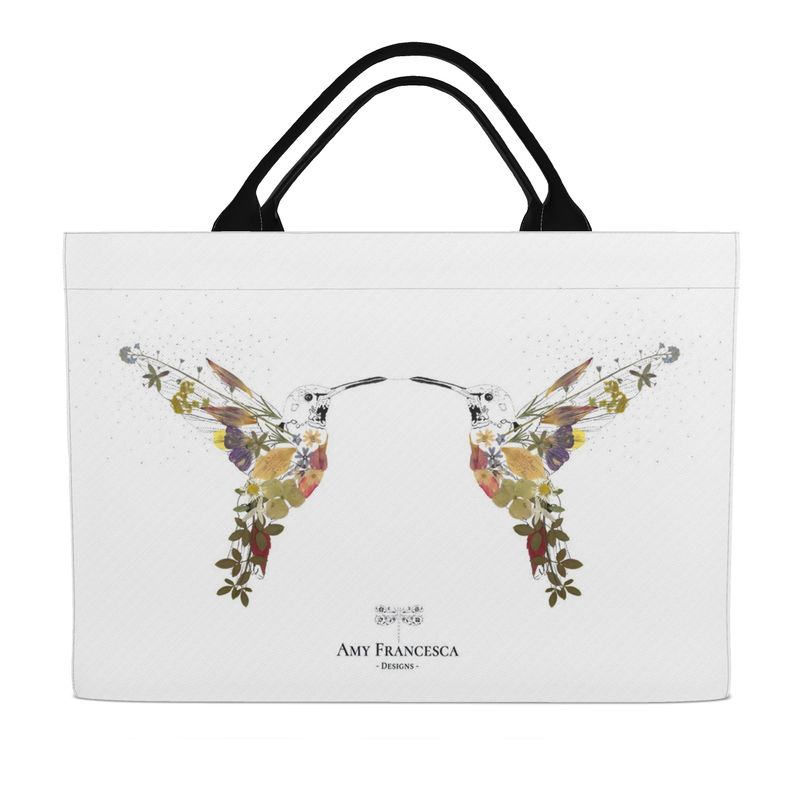 Tote bag featuring two hummingbirds facing each other on a white background with black handles.